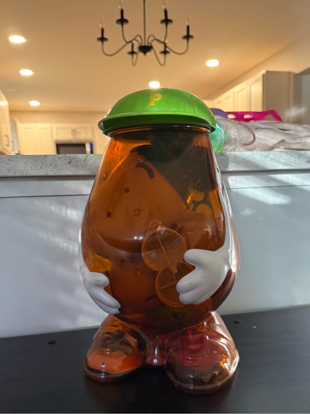 Brown Potato-Style Figure Toy with Green Helmet